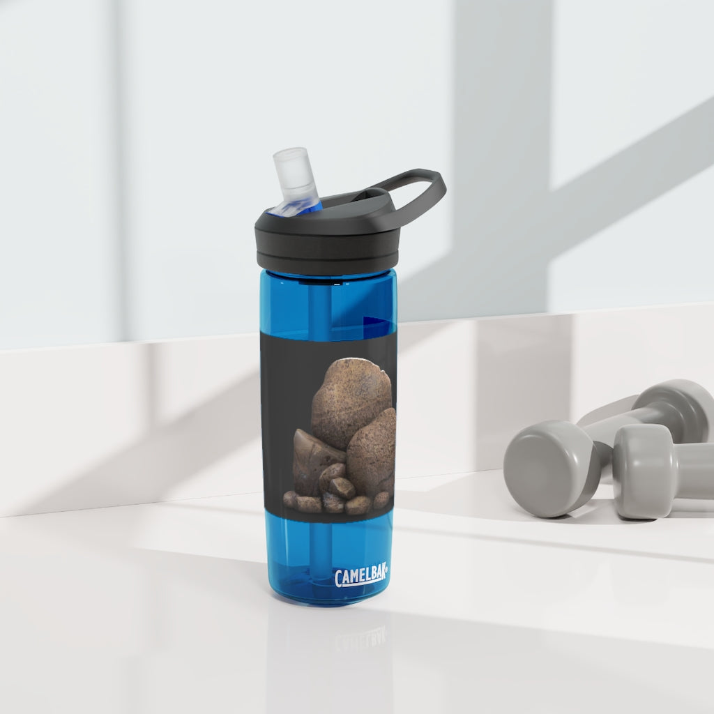 Rocks CamelBak Eddy® Water Bottle in 20oz and 25oz sizes, showcasing its durable Tritan™ material and spill-proof design.